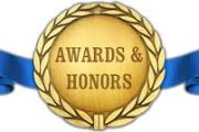  Medal with blue ribbon that reads Awards and honors
